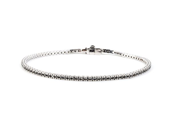 Bracciale tennis in oro con diamanti neri    