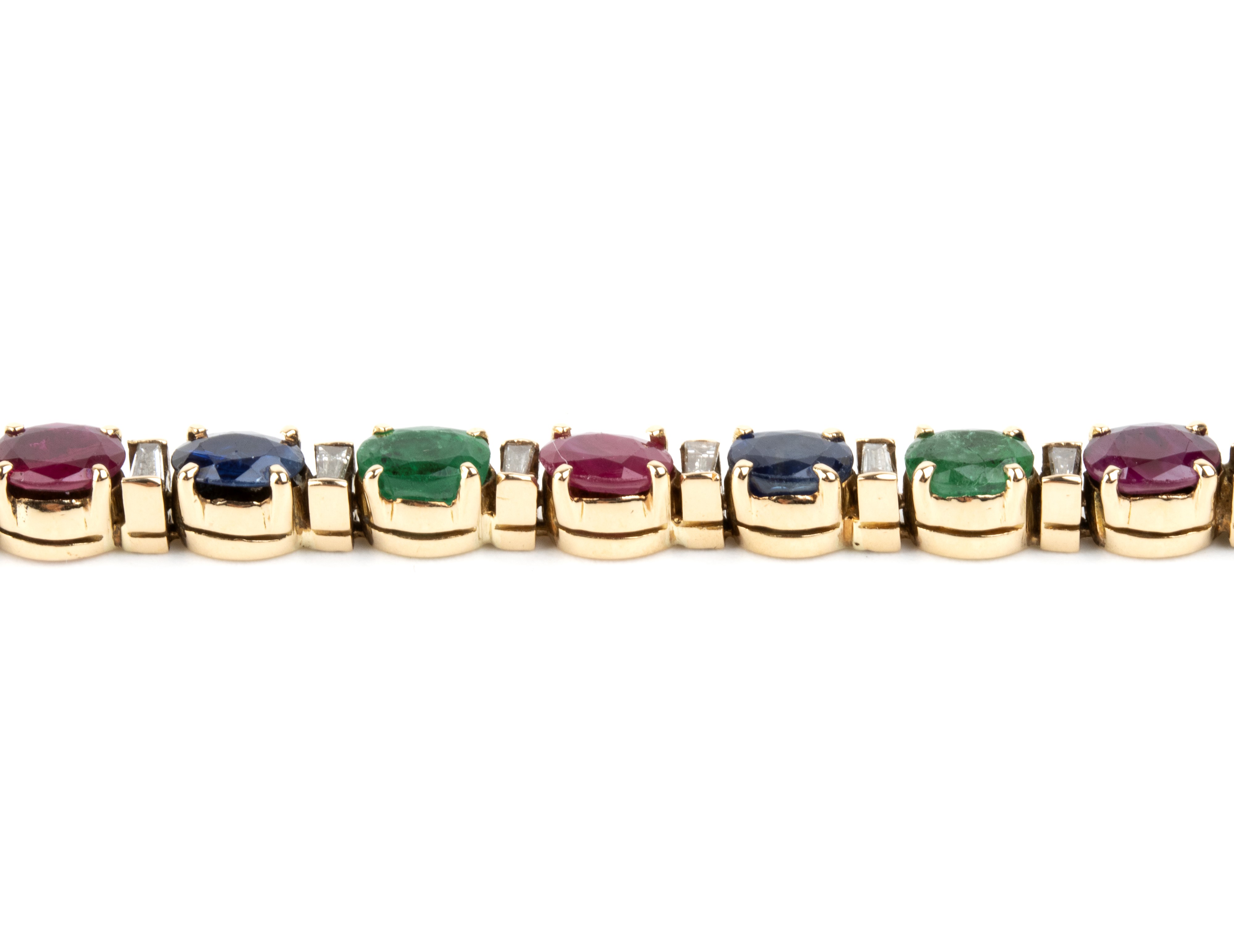 Bracciale tennis in oro giallo 18k con zaffiri, rubini, smeraldi e diamanti (baguette)
