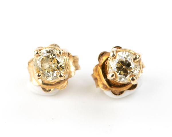 Paio di orecchini in oro con diamanti   