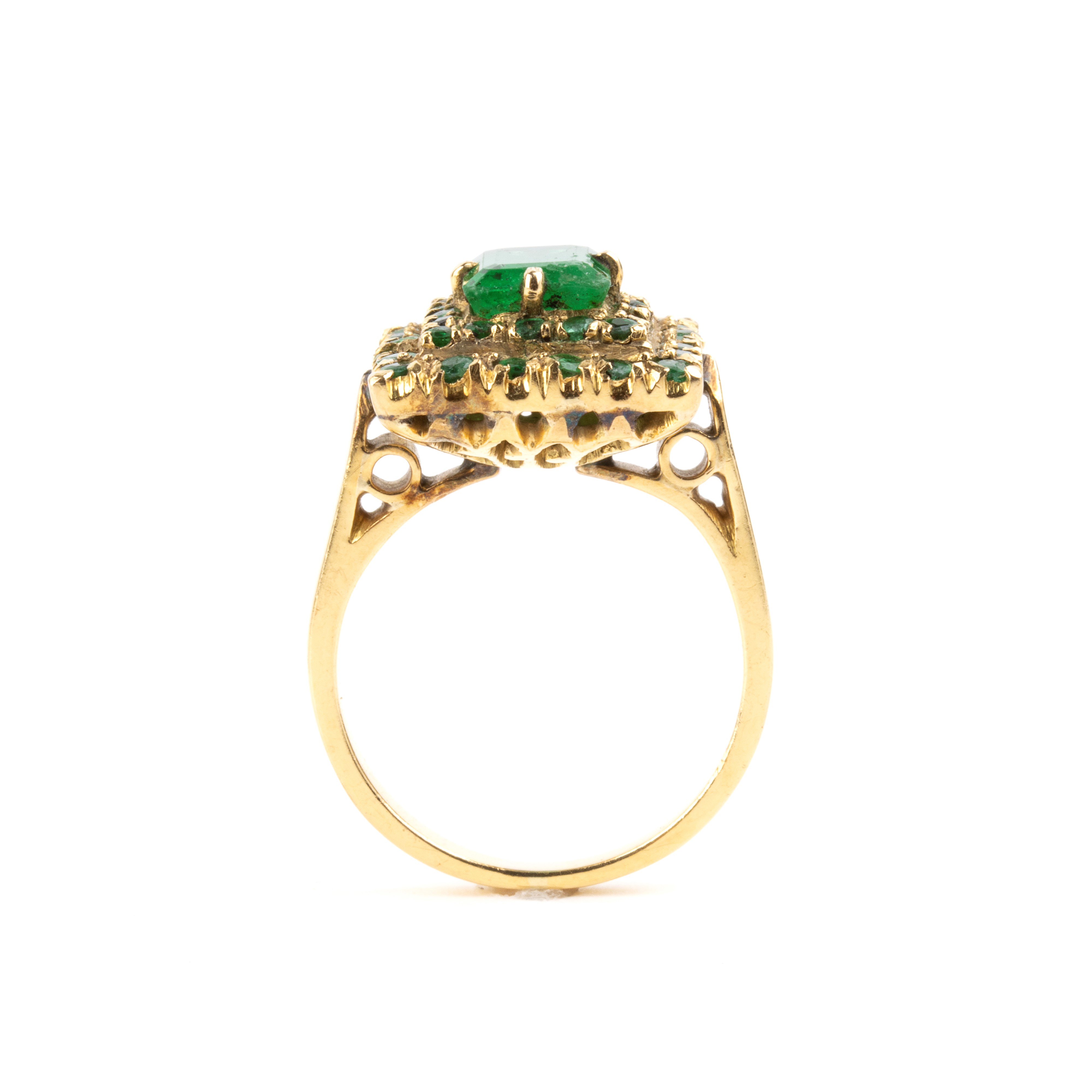 Anello in oro bianco 18k con smeraldi