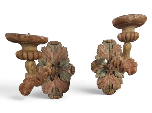 Pair of polychrome candleholders