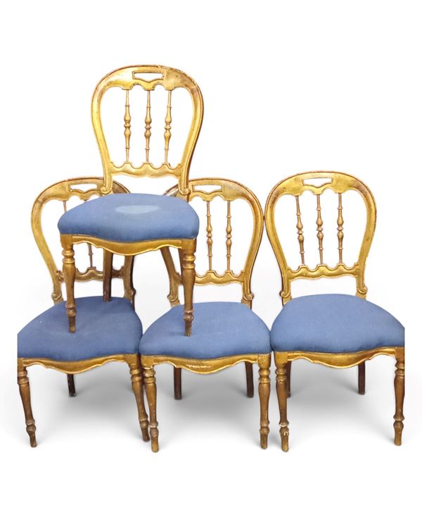 Set of four gilded chairs