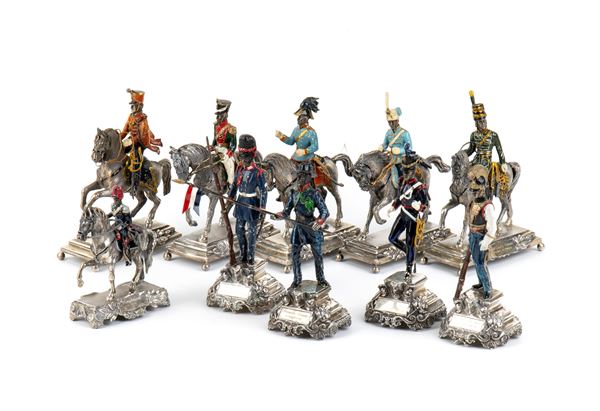 Gruppo di dieci sculture italiane in argento e smalti policromi