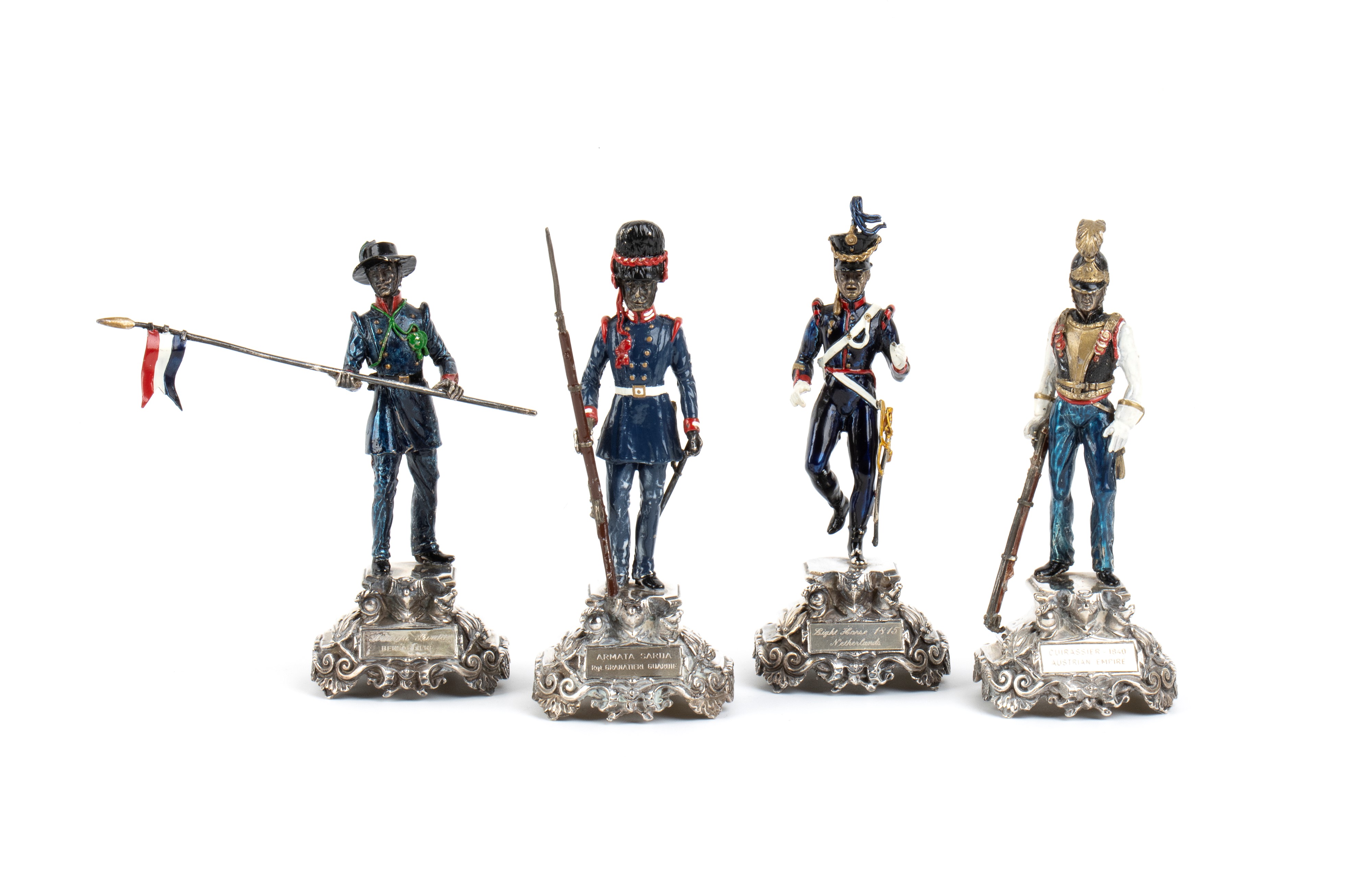 Gruppo di dieci sculture, argento 800/1000 e smalti policromi raffiguranti soldati, seconda metà ...