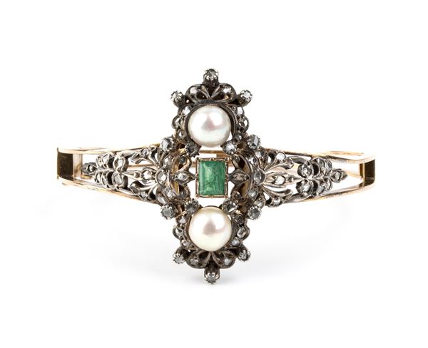 Bracciale a cerchio rigido in oro ed argento con smeraldo, perle e diamanti 