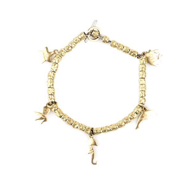 Bracciale in oro ed argento con pendenti