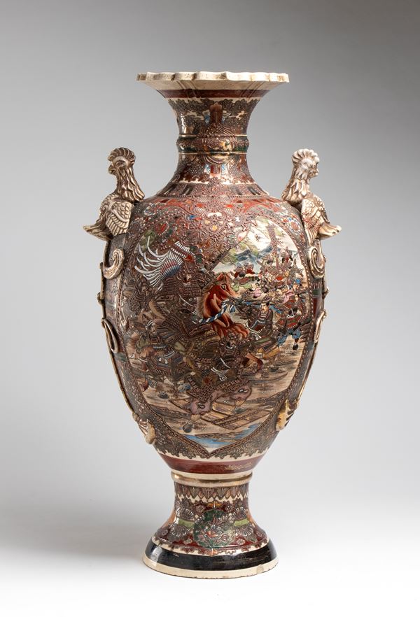A large Satsuma ceramic vase painted with polychrome battle scenes. Japan, Meiji period, late 19th century.