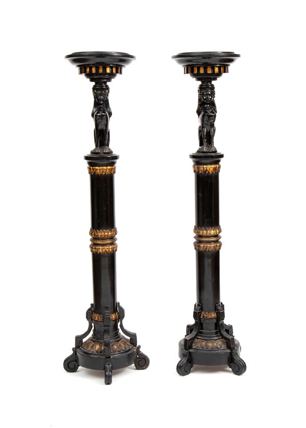 Pair of ebonized Empire-style columns