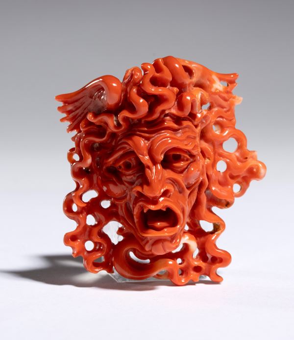 Coral carving depicting the head of Medusa