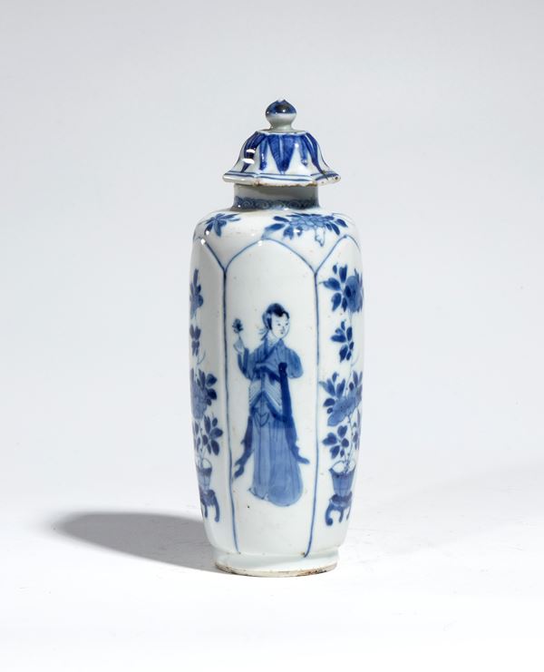 A small hexagonal blue and white porcelain vase decorated with female figures, with a lid. China, Qing Dynasty, Kangxi period.