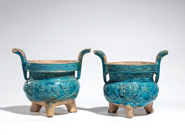 A pair of three-legged turquoise-glazed ceramic ceremonial incense burners. China, Ming Dynasty, 17th century.