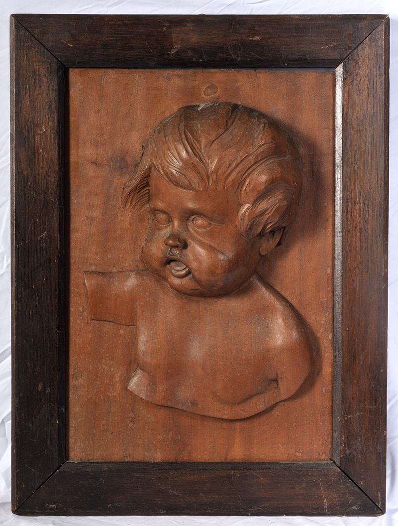 Busto di Fanciullo in Altorilievo in Legno