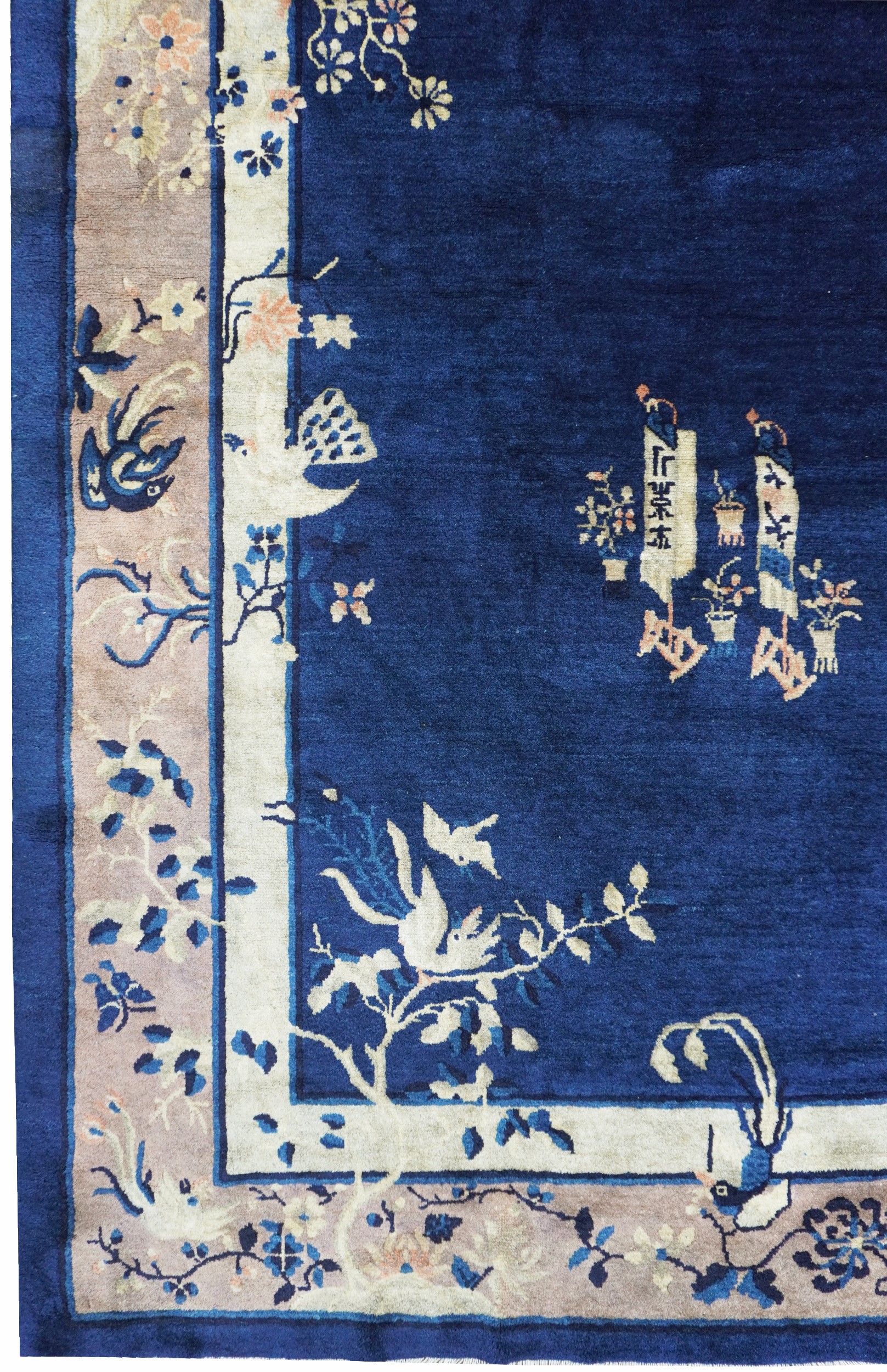 Cina settentrionale (fine XIX secolo), Tappeto Pechino, medaglione ogivale su fondo blu