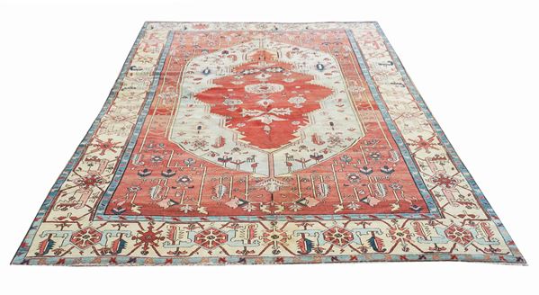 An antique Serapy carpet