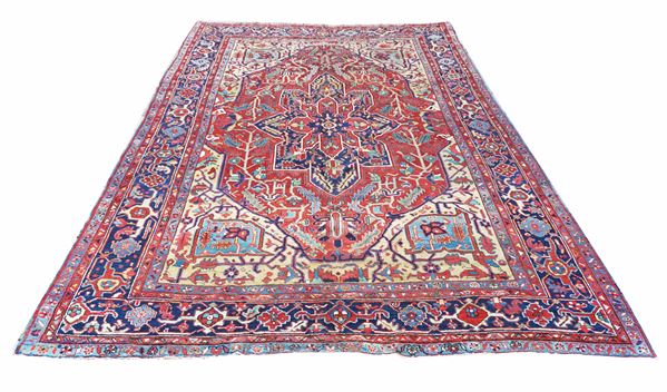 A Heriz medallion carpet