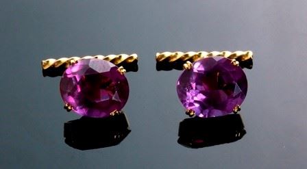 A pair of gold cufflinks...