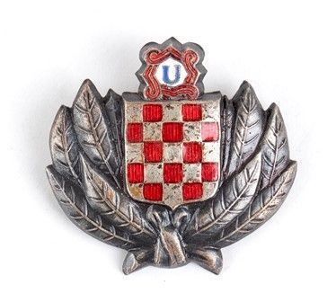 Croazia, Stato indipendente della Croazia               Fregio da berretto     ...  - Auction Fashion & Luxury, Gioielli, Memorabilia, Militaria, Medaglie e Ordini Cavallereschi - Bertolami Fine Art - Casa d'Aste