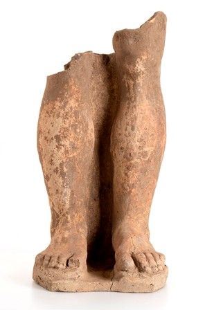 PARTE INFERIORE DI GRANDE STATUA VOTIVA
IV - III secolo a.C.
Terracotta, alt. c...
