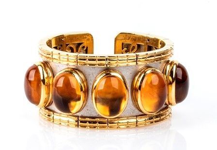 Bracciale a fascia rigida in oro ed acciaio con quarzi citrini ...