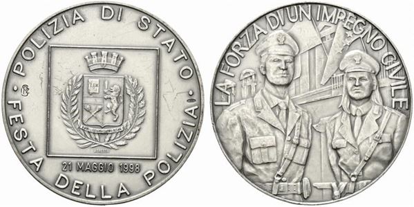 POLIZIA DI STATO. Medaglia Festa della Polizia 21 maggio 1998. LA FORZA DI UN I...  - Auction MARIA PIA E AMINTORE FANFANI - Bertolami Fine Art - Casa d'Aste