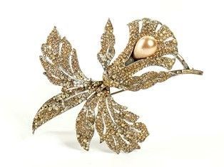 SPILLA A FORMA DI FIORE
 ...