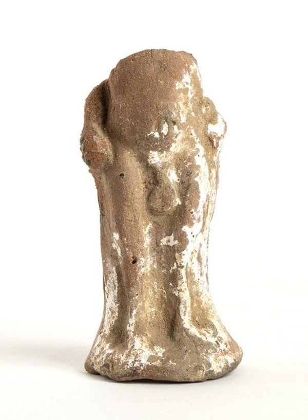 STATUINA MASCHILE
IV - III secolo a.C.
Terracotta, alt. cm 8,5

Porzione inferi...