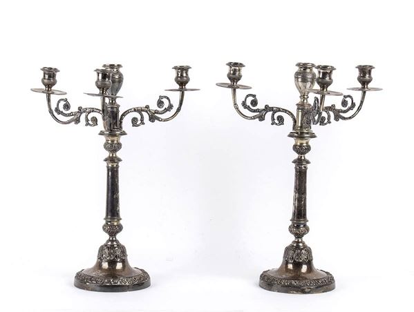 A pair of Italian silver candelabra