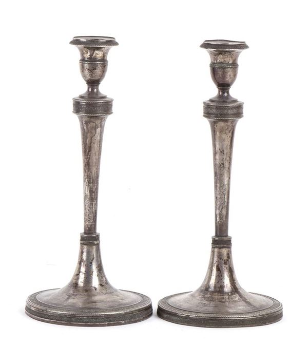 A pair of Italian silver candlesticks