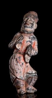 FIGURA DI STRANIERO BARBUTO IN CERAMICA DIPINTA
Cina, stile della dinastia Tang...