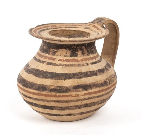 BROCCHETTA DAUNIA SUBGEOMETRICA
V - IV secolo a.C.
alt. cm 11

Con decorazione ...