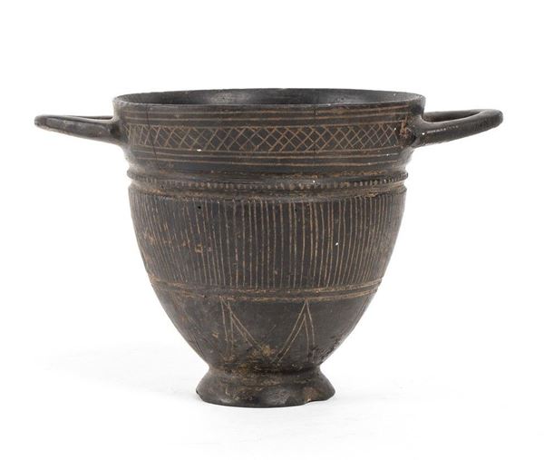 SKYPHOS ETRUSCO IN BUCCHERO GRAFFITO
VII - VI secolo a.C.
alt. cm 11; diam. cm ...