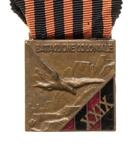 MEDAGLIA IN BRONZO DEL XXIX BATTAGLIONE COLONIALE...  - Asta La collezione Clodomiro Tavani di medaglie, onorificenze e ordini cavallereschi - Bertolami Fine Art - Casa d'Aste