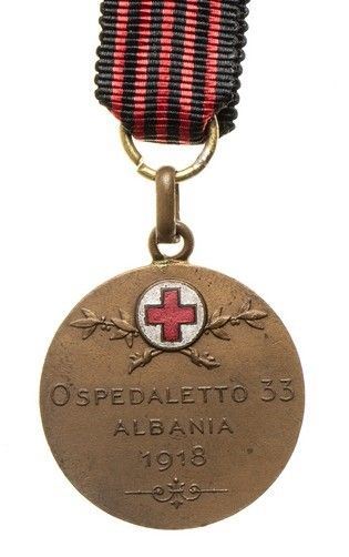 MEDAGLIA COMMEMORATIVA DELL’OSPEDALETTO 33 IN ALBANIA 1918...  - Auction La collezione Clodomiro Tavani di medaglie, onorificenze e ordini cavallereschi - Bertolami Fine Art - Casa d'Aste