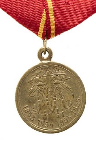 A Russian Imperial Crimean War Medal 1853-1856...  (ORDINI E MEDAGLIE - RUSSIA, IMPERO...)  - BRONZe, 28 MM - Auction Militaria, Medals and Orders of Chivalry - Bertolami Fine Art - Casa d'Aste