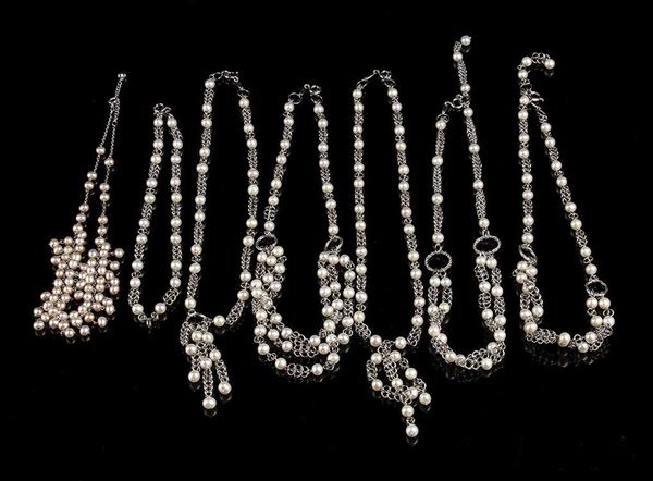 6 collane ed 1 bracciale in perle di fume ed argento...