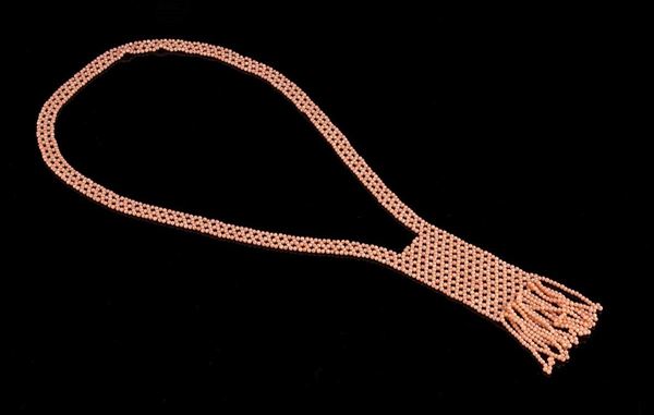 Girocollo a maglia tessita in corallo rosa ...