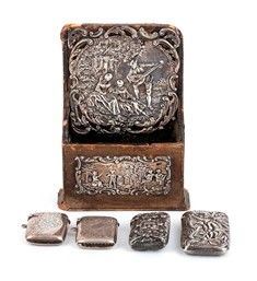 Portacarte inglese e quattro portafiammiferi in argento - inizio XX secolo ...  - Asta Gioielli, orologi, argenti, penne ed altri oggetti d'arte e da collezione. - Bertolami Fine Art - Casa d'Aste