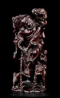 A WOOD DAOIST IMMORTAL LI TIEGUAI  - Auction Asian and Tribal Art - Bertolami Fine Art - Casa d'Aste