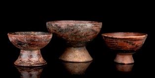 THREE PAINTED POTTERY STEM BOWLS