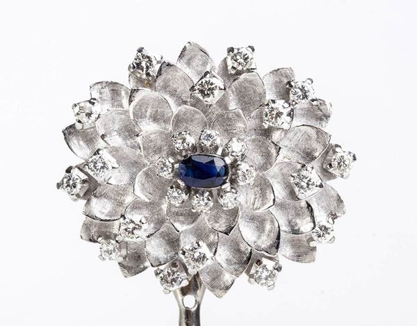 Diamond sapphire floral brooch...