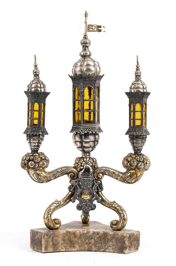 A particular Italian silver candelabrum 