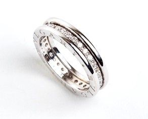 Anello in oro e diamanti, modello B zero  - firmato BULGARI...