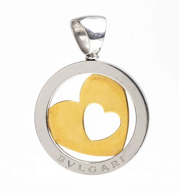 BULGARI: tondo heart gold and steel pendant 