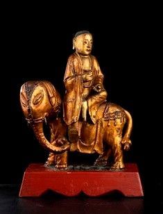 LOHAN SU ELEFANTE IN LEGNO DORATO - Cina, dinastia Qing

La divinità seduta sul dorso dell’animale con le gambe in ...